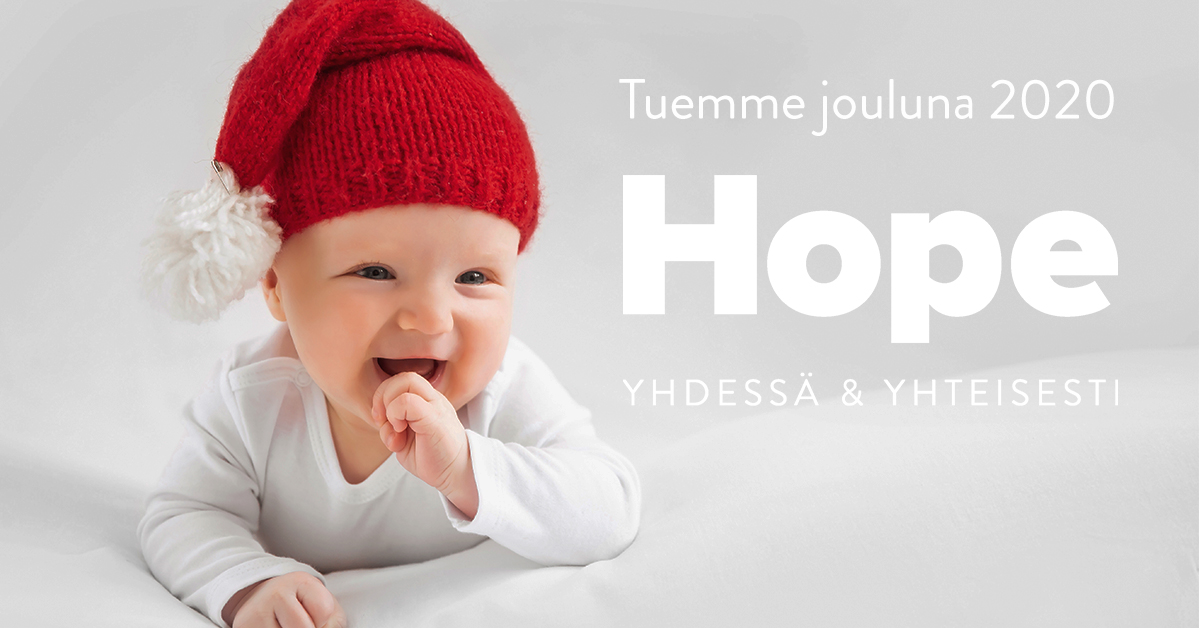 Vauva tonttulakki päässään.